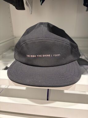Vuori Black Five-Panel Cap with Pink Accent Text
